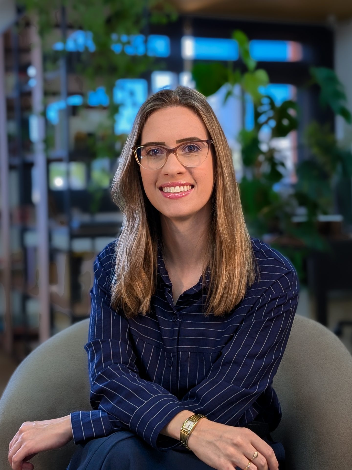 Portrait of Tainá Bauerfeld, Head of People & Culture at PureCode IT